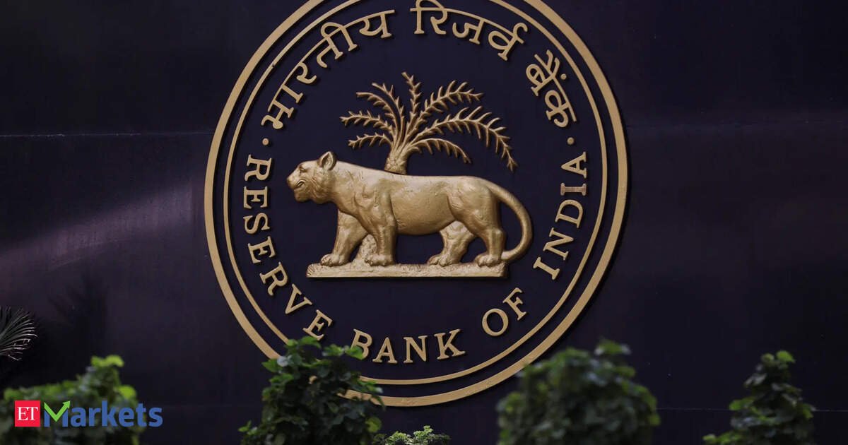 Rupee hits record low, RBI intervention averts fall past 92